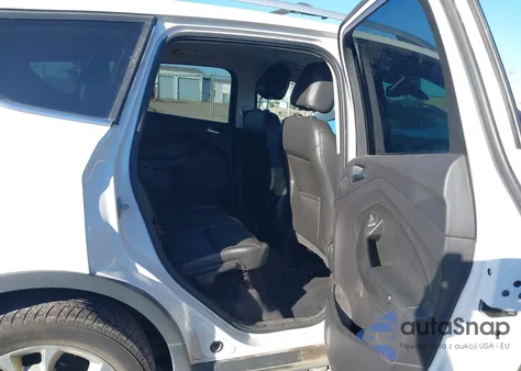 2016 Ford Escape Titanium z USA, uszkodzony, nr VIN 1FMCU9JX1GUA12433